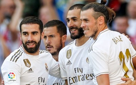 Os jogadores Carvajal (à esq.), Hazard, Benzema e Bale, do Real Madrid, que joga pela Champions League