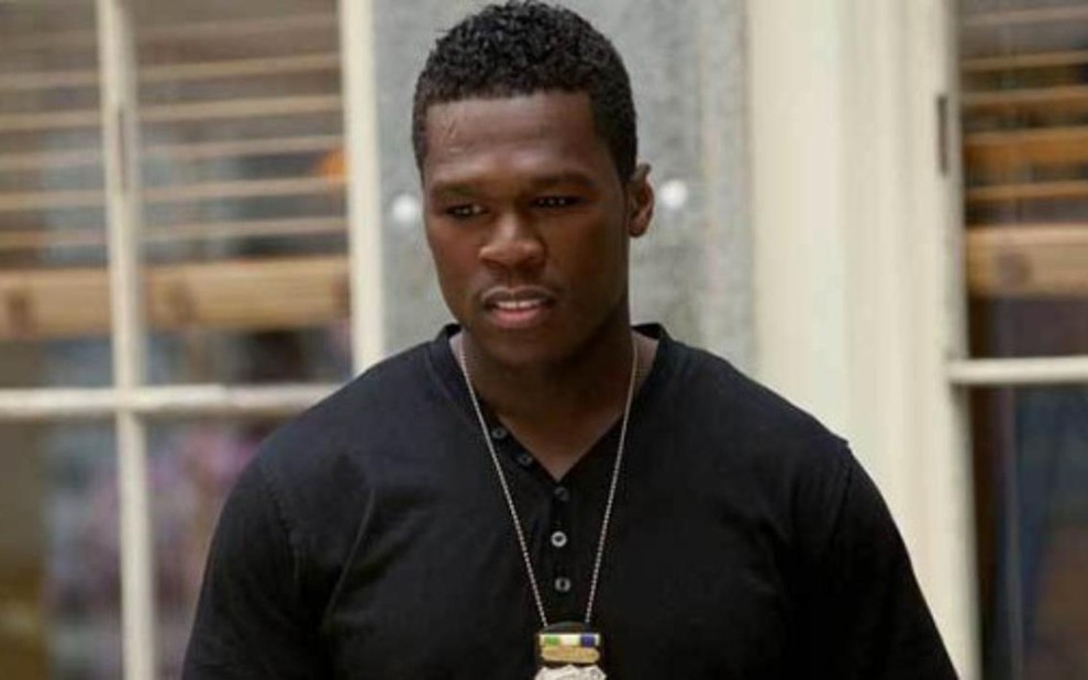 O rapper 50 Cent em cena de Assassinos de Aluguel (2012), um dos sete filmes que ele já produziu - Divulgação