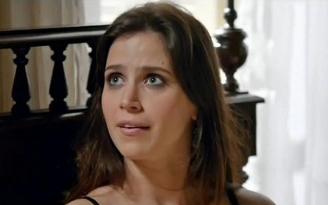 A atriz Mel Lisboa interpreta Marcinha em cena de Pecado Mortal, novela da Record - Reprodução/TV Record