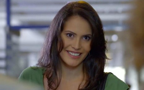 A atriz Ana Carolina Dias, que interpreta uma ex-amante de Ricardo (Herson Capri) em Em Família - Reprodução/TV Globo