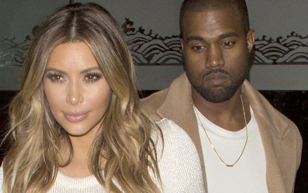 A socialite Kim Kardashian e o rapper Kanye West, que se casaram no último fim de semana na Itália - Reprodução