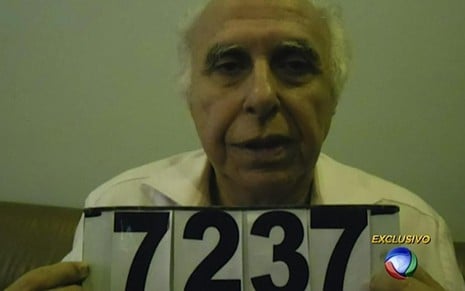 O ex-médico Roger Abdelmassih é 'fichado' após ser preso no Paraguai com a colaboração da Record - Reprodução/TV Record