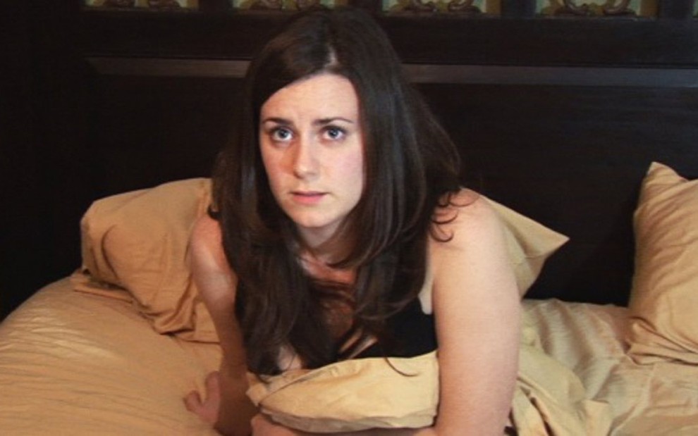 A atriz Katie Featherston em cena do filme Atividade Paranormal (2007); casa foi vendida em oito dias - Divulgação