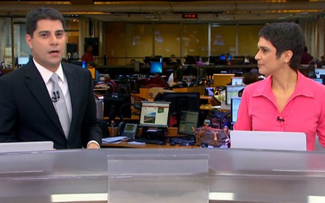 Evaristo Costa e Sandra Annenberg apresentam o Jornal Hoje; âncora foi repreendido por colega - Reprodução/TV Globo