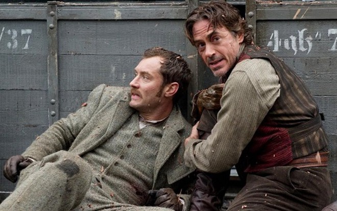 Os atores Jude Law e Robert Downey Jr. em Sherlock Holmes - O Jogo das Sombras, de 2011 - Divulgação