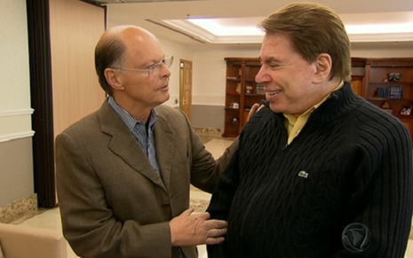Edir Macedo e Silvio Santos conversam durante visita ao Templo de Salomão, há duas semanas - Reprodução/TV Record