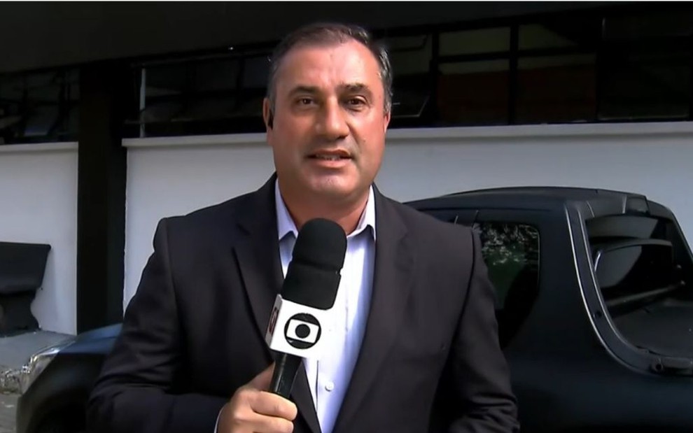 O jornalista César Galvão em entrada ao vivo no Jornal Hoje desta quinta-feira (13): reforço policial - Reprodução/TV Globo