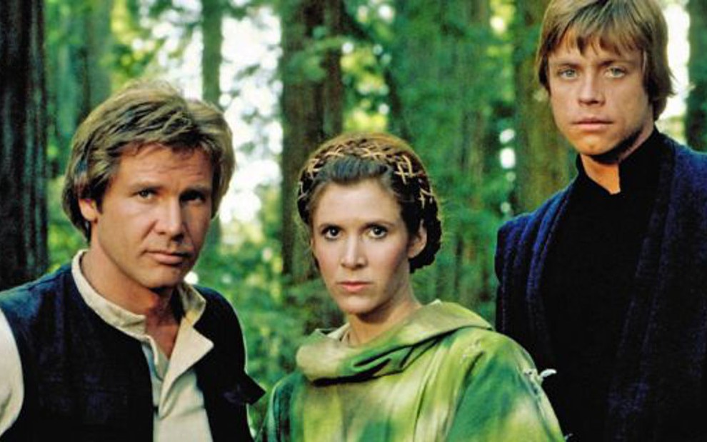 Harrison Ford (à esq.), Carrie Fisher e Mark Hamill em gravação de O Retorno de Jedi, de 1983 - Imagens: Divulgação
