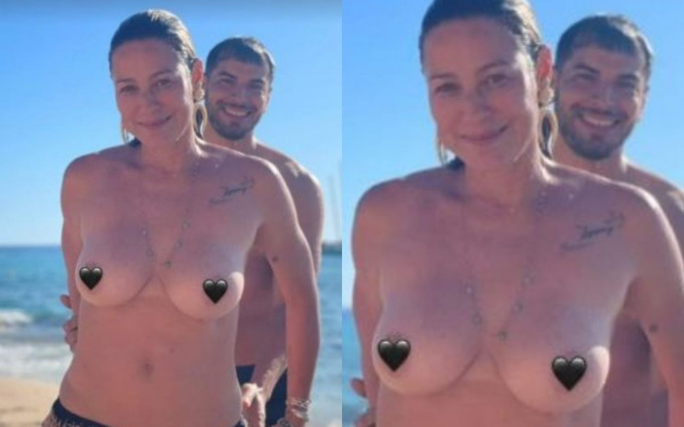 Luana Piovani faz topless em praia